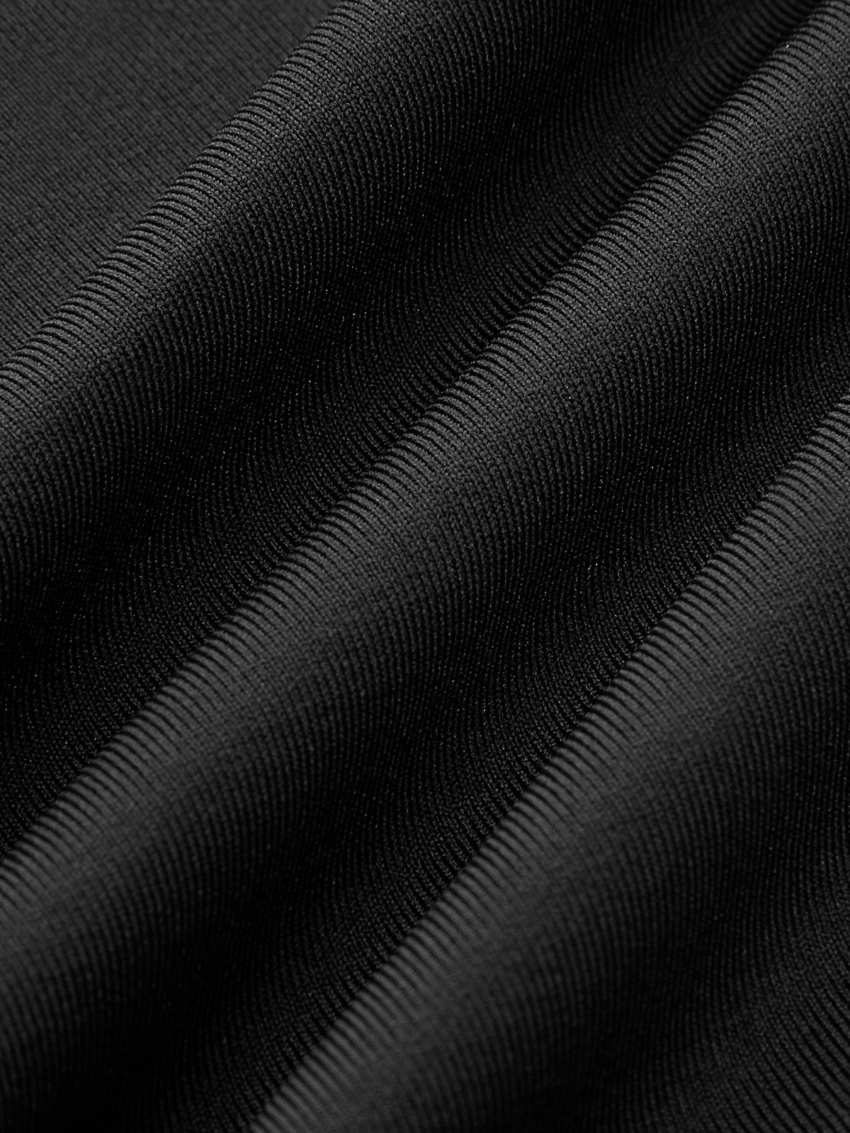 Éclat Bordeaux — negro: detalle del tejido.