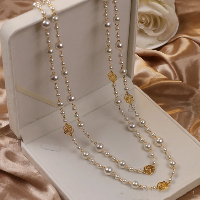 Elegante collar de oro con perla