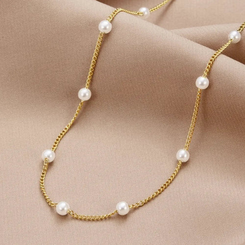 Anillo de oro con perla de agua dulce