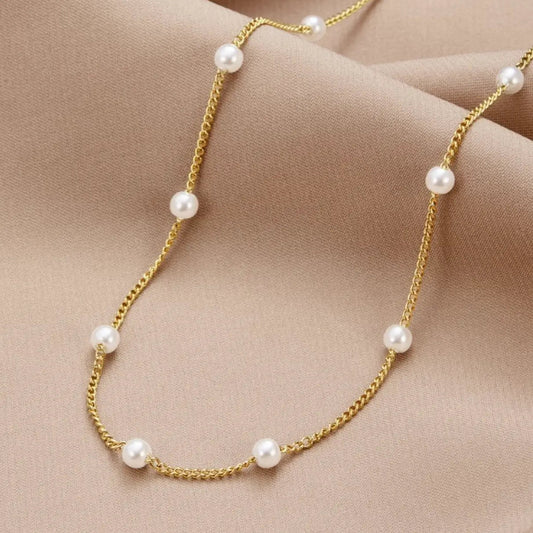 Anillo de oro con perla de agua dulce