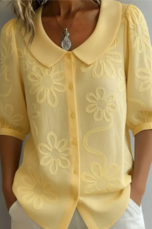 Marisa | Blusa con cuello de flores