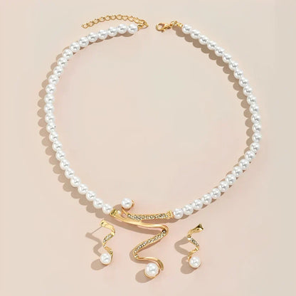 Juego de collar y pendientes de perlas naturales