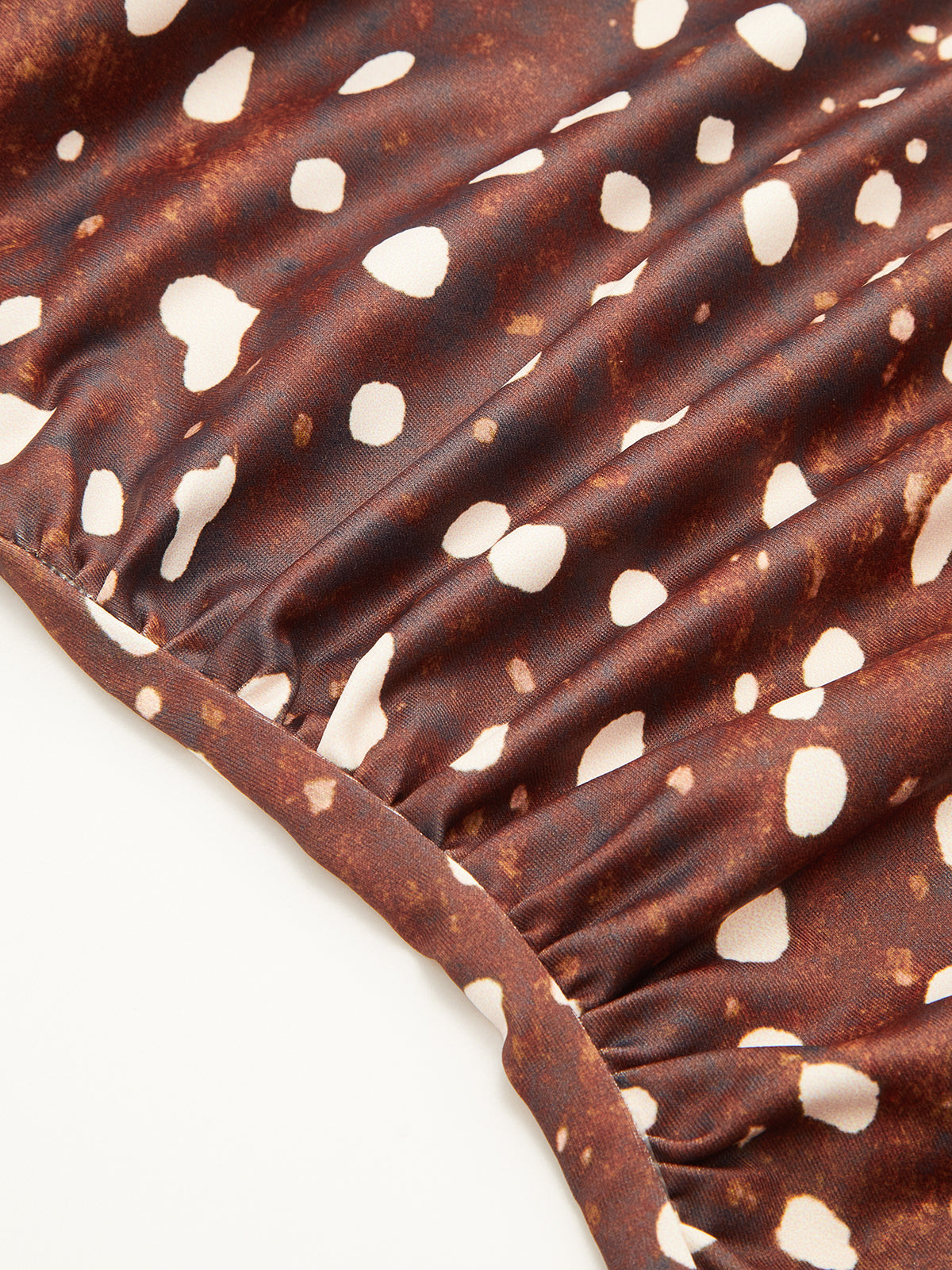 Fauna Chocolate — marrón: detalle del acabado.
