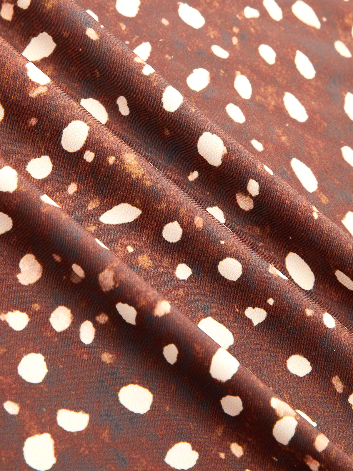 Fauna Chocolate — marrón: detalle del estampado.