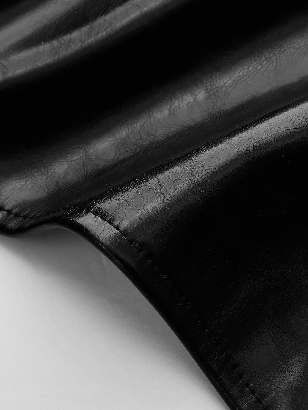 Siena Noir — negro: detalle del fajín.
